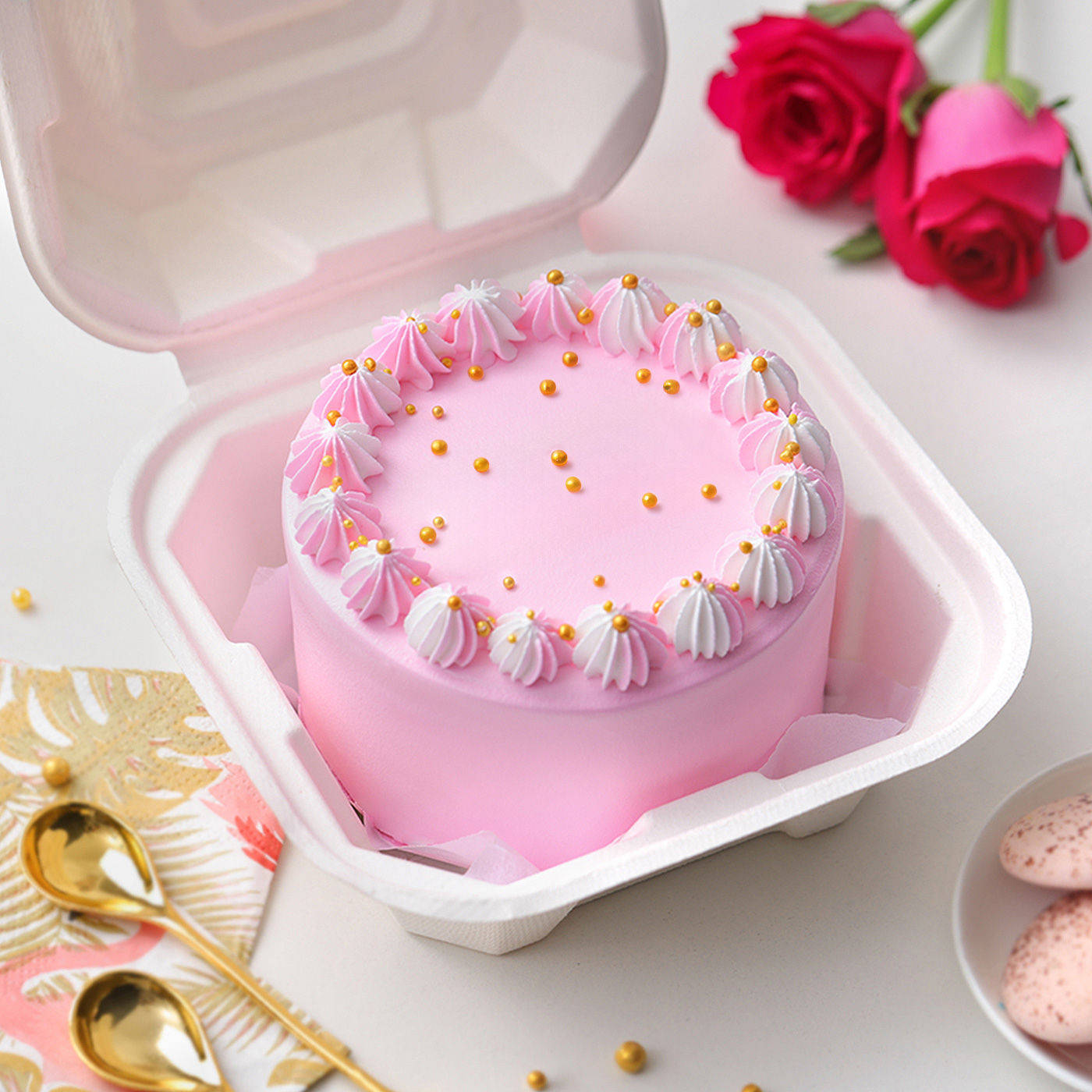 Pink mini cake in a box
