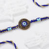 Gift Classic Evil Eye Rakhi And Sweets Hamper