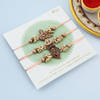 Buy Divine Antique Pearl Rakhi (Set of 3)
