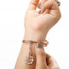 Elegant Ganesh Lumba Rakhi And Watch Charm
