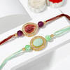 Enchanting CZ And Stone Rakhi Set Of 2