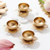 Shop Enchanting Floral Metal Diyas - Set Of 4