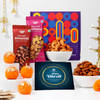 Buy Gleaming Candles And Diwali Treats Combo