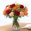 Mixed bouquet of warm orange and red tones