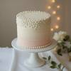 Pearl-Touched Beige Layered Cake (500 Gm)