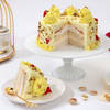 Shop Rasmalai Burst Cake And Rose Bouquet Combo