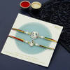Buy Silver Coated Krishna Rakhis of Divinity Set of 2