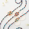 Striking Multicoloured Pearl And Meena Work Rakhi Set Of 3