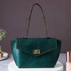 Teal Embossed Wrist Bag For Women