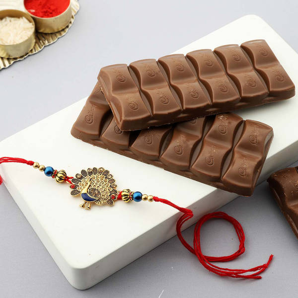 Antique Metal Peacock Rakhi with Dairy Chocolates (2 Pcs)