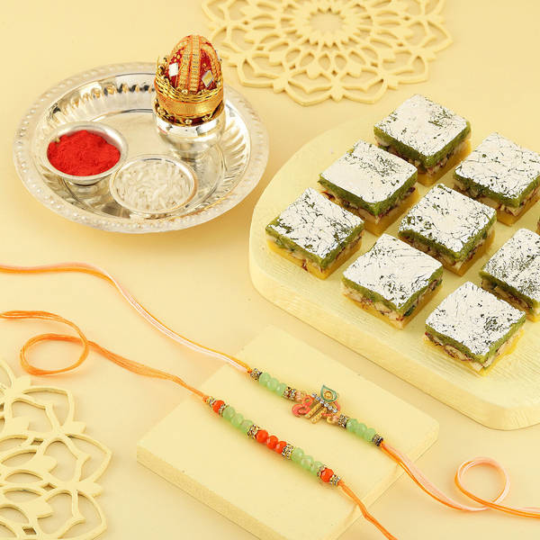 Auspicious Beads Rakhis With Pista Badam Barfi And Pooja Thali