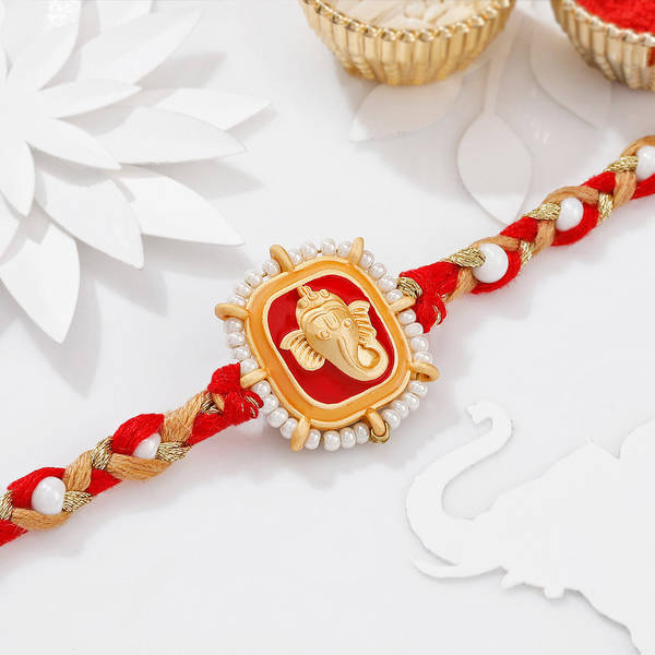 Auspicious Pearl And Meena Work Ganesha Rakhi