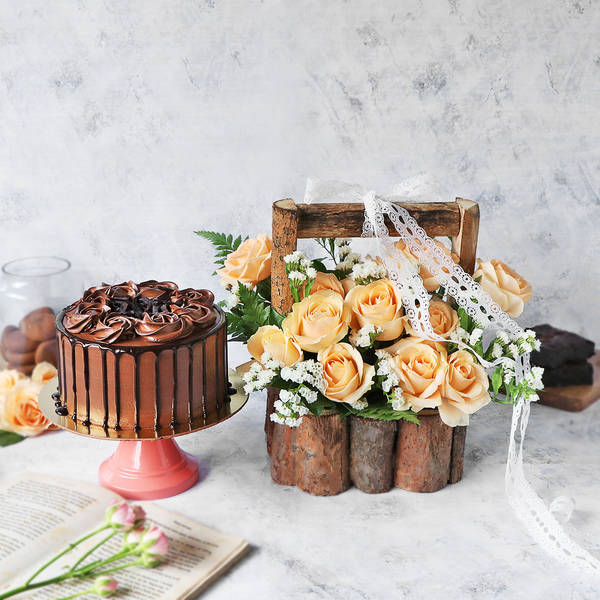 Dark Chocolate Ganache Cake With Basket Of Peach Roses