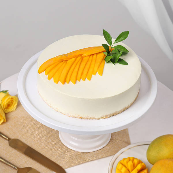 Delicious Mango Indulgence Cake (Half Kg)