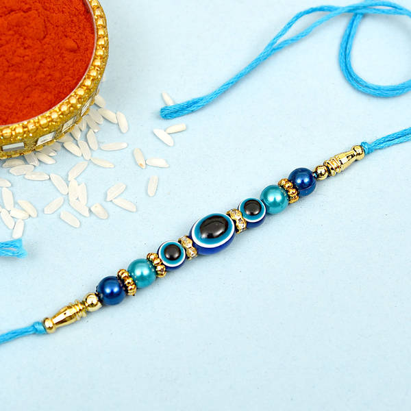 Evil Eye Rakhi with Blue Beads