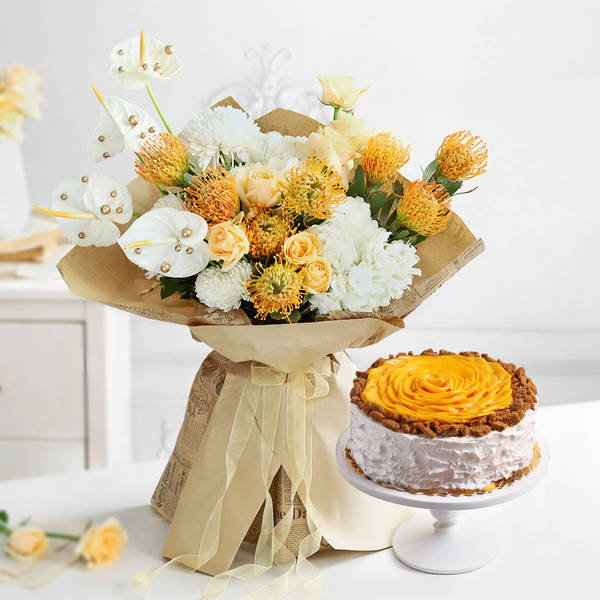 Golden Blooms And Mango Delight Gift Combo