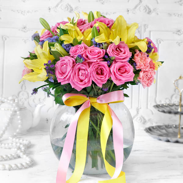 Mix Flowers in Globe Vase