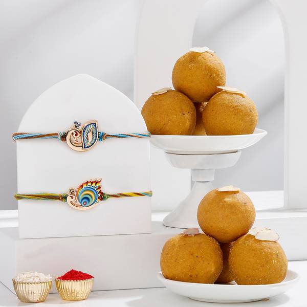 Peacock Rakhi Set Of 2 With Besan Laddoos
