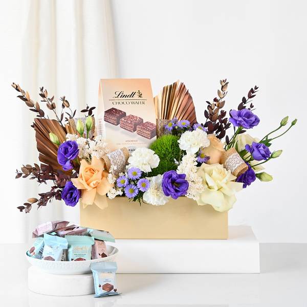 Symphony Of Blooms And Gourmet Arrangement