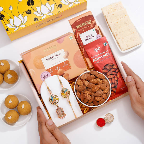 Temple Design Rakhi With Scrumptious Goodies Hamper