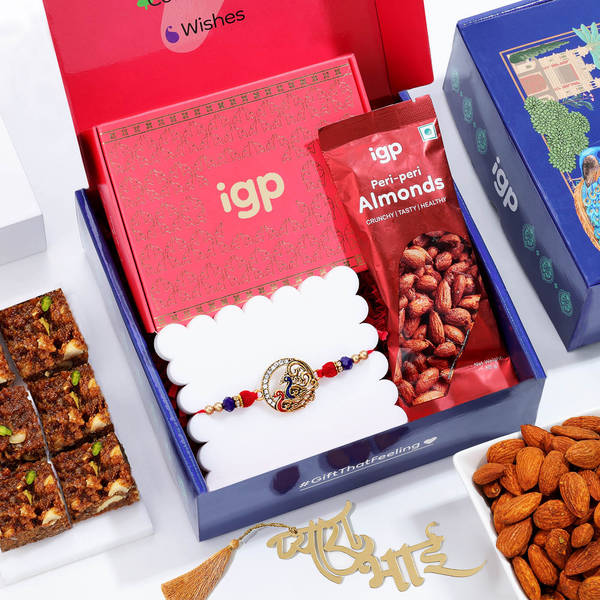 Timeless Peacock Rakhi With Gourmet Sweets