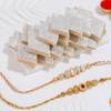 Shimmering Kundan Rakhis Gift Combo