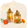 Collection of decorative clay and metal diyas